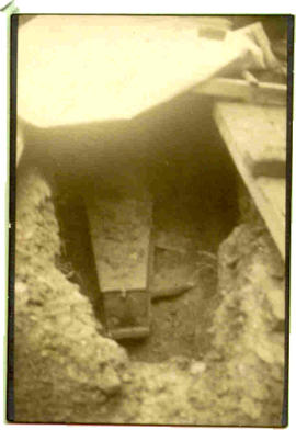 1937 Exhumation: nearer view of coffin after grave opening