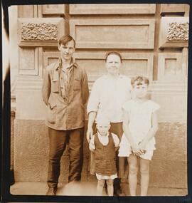 Family outside the Grand Hotel, Moscow