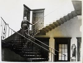 Capuchin friar ascends staircase at Ard Mhuire Friary, County Donegal