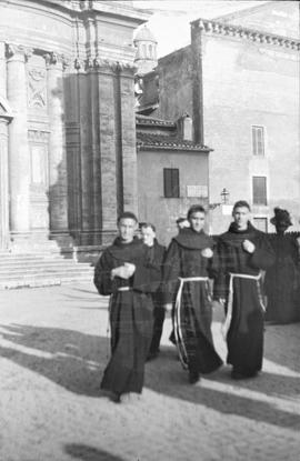 Observant Franciscans on a Piazza