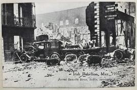 Irish Rebellion, May 1916 / Ruined Sackville Street, Dublin, barricaded with motor cars