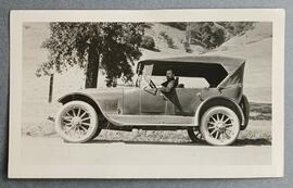 Fr. Raphael Quinn in an automobile